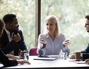 IMAGE: Woman leading business meeting