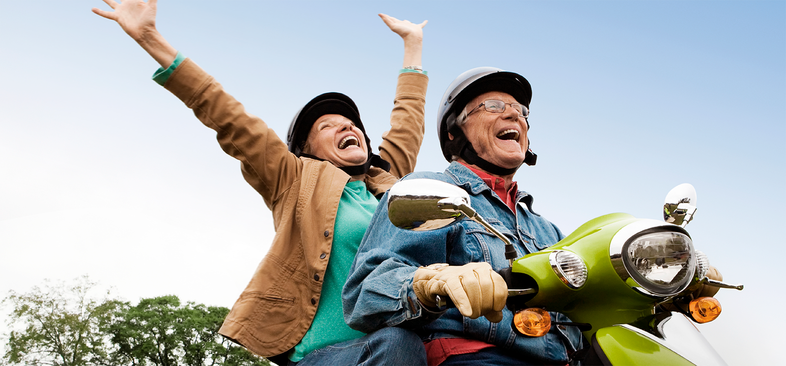 IMAGE: Couple riding on a motorcycle