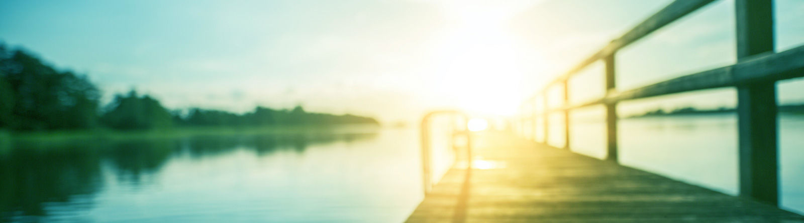 IMAGE: dock on a lake at sunset